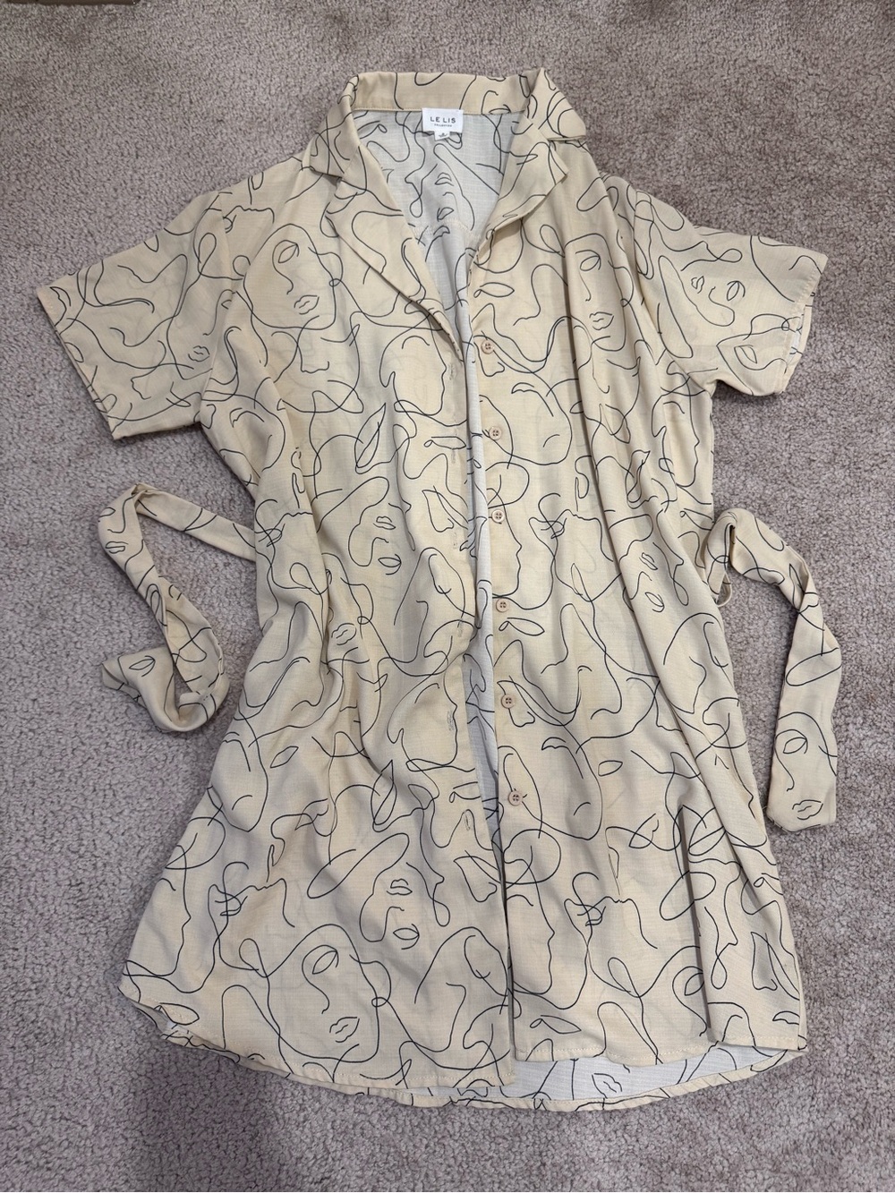 Le Lis Cream Midi Dress with Abstract Black Line Print